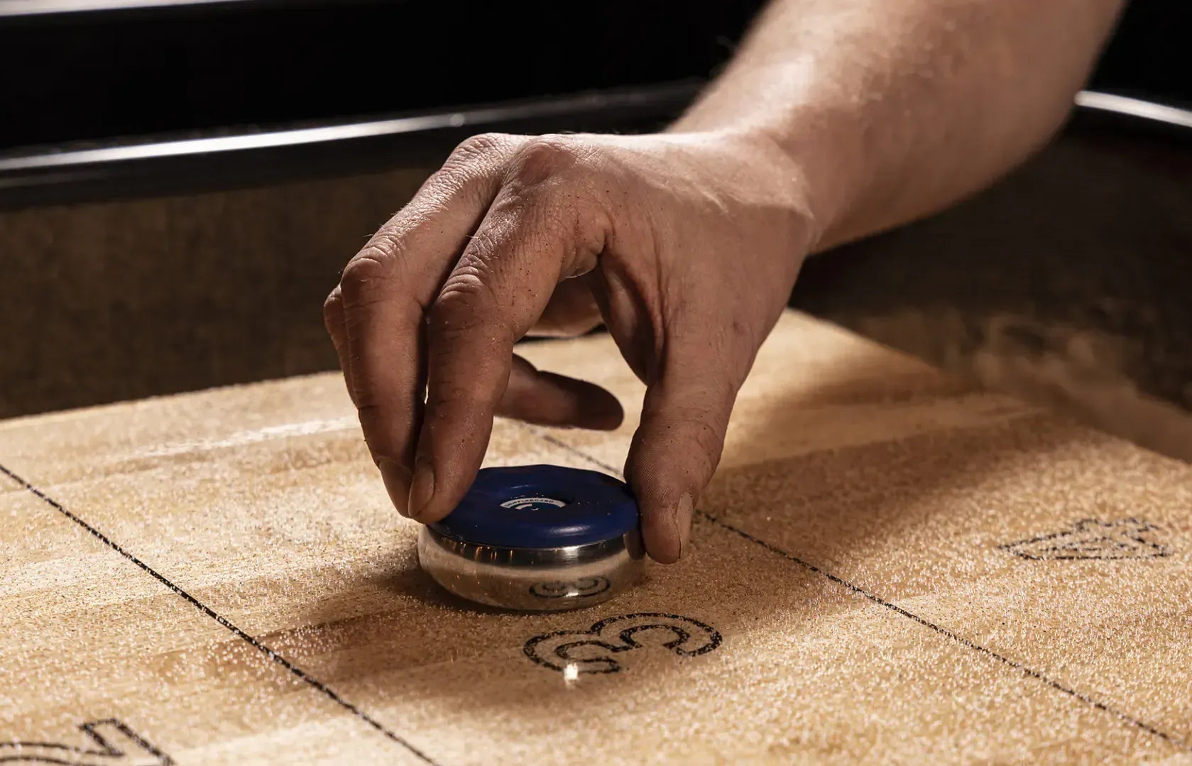 A shuffle puck being showed close up